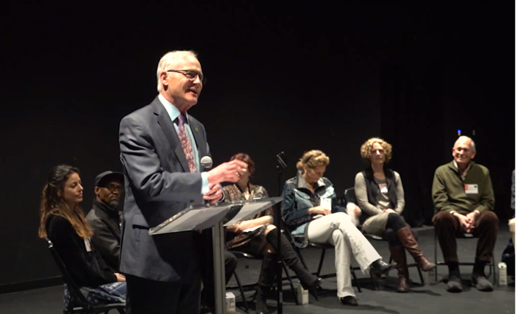 Sen. Barrett introducing a panel at the Umbrella Arts Center