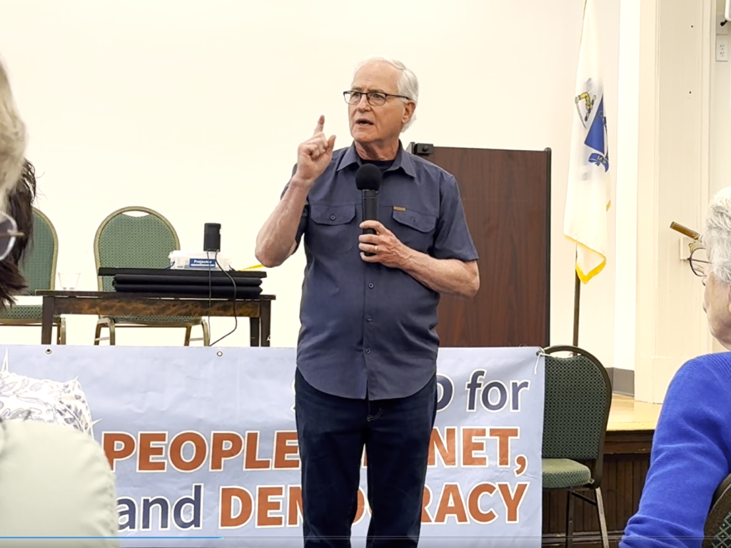 Senator Barrett addresses a crowd at a Concord Indivisible event